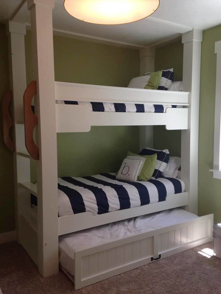 Example of a small classic boy carpeted kids' room design in Denver with green walls