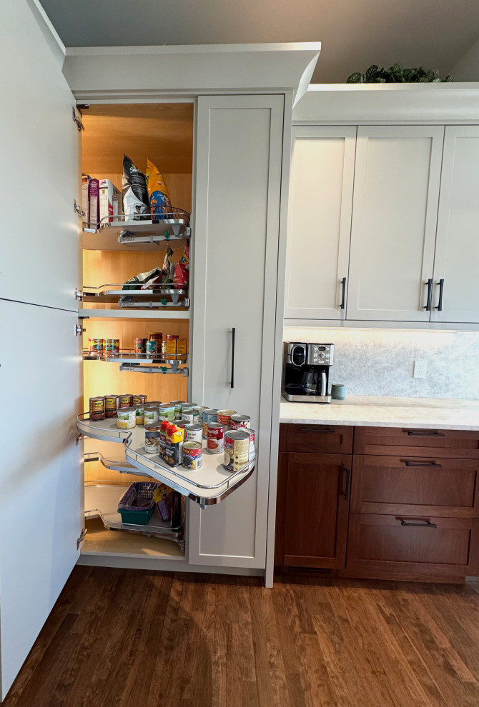Kitchen pantry - large transitional single-wall dark wood floor and brown floor kitchen pantry idea in Calgary with shaker cabinets, gray cabinets, quartzite countertops, multicolored backsplash, stone slab backsplash and multicolored countertops