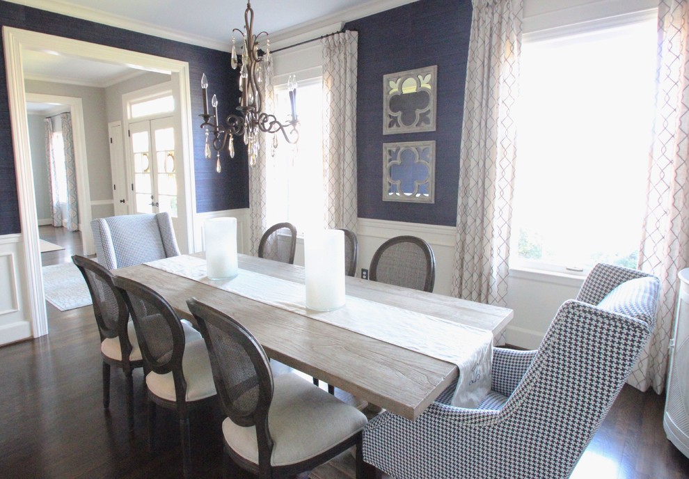 Design ideas for a mid-sized transitional separate dining room in Charlotte with blue walls, dark hardwood floors and no fireplace.