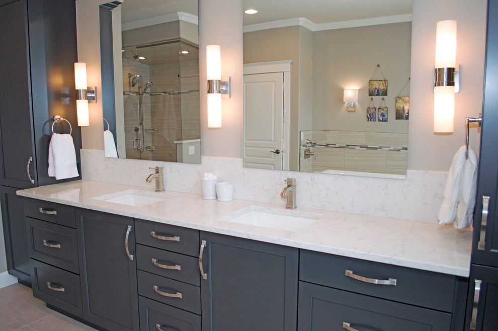 Inspiration for a large transitional beige tile and porcelain tile porcelain tile sauna remodel in Seattle with an undermount sink, shaker cabinets, gray cabinets, quartz countertops, an undermount tub, a bidet and gray walls