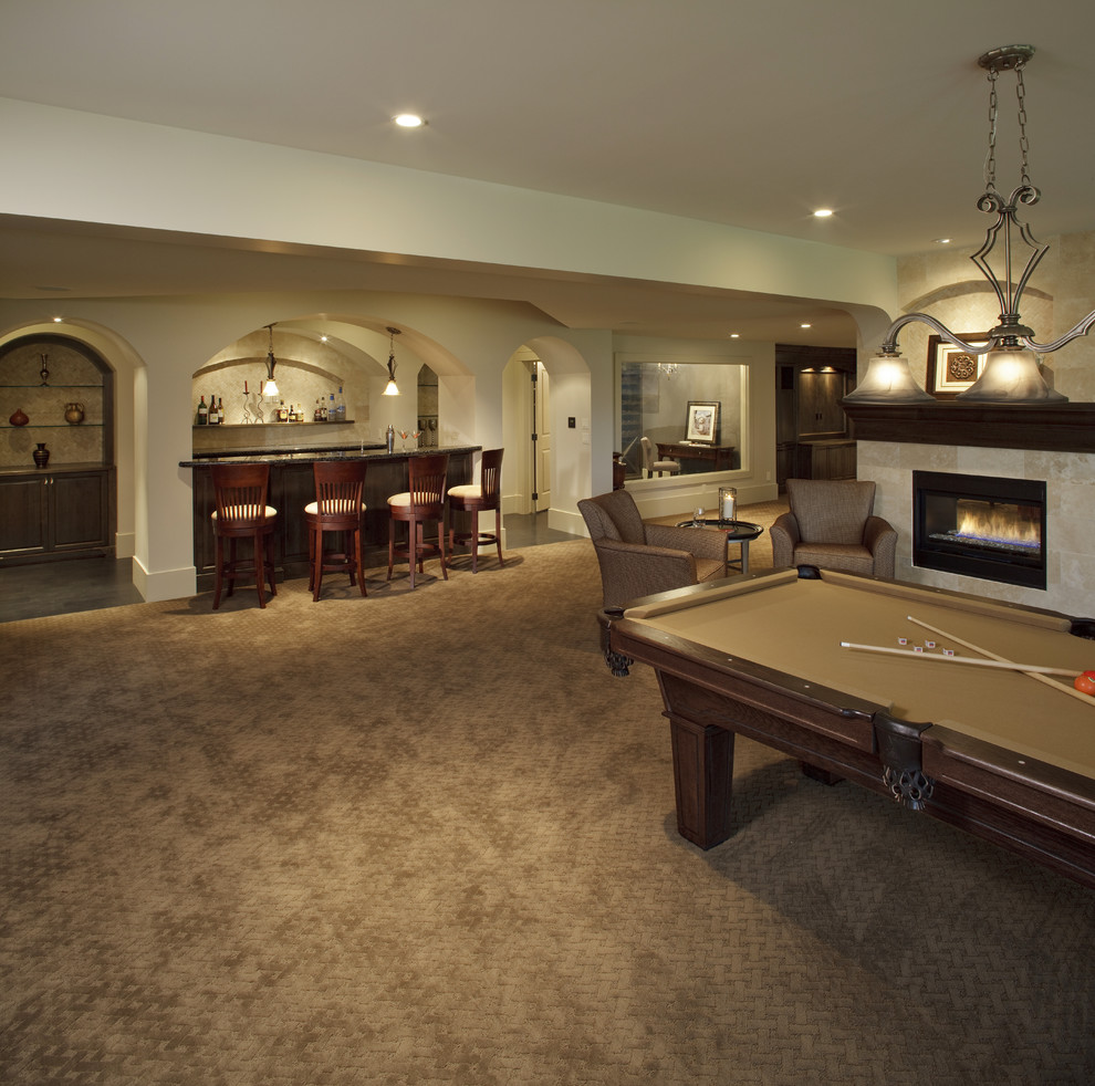 Design ideas for a traditional basement in Calgary.