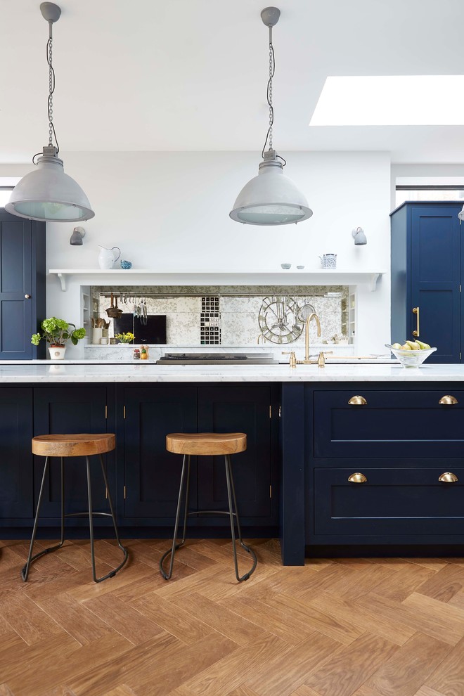 Photo of a transitional kitchen in London.