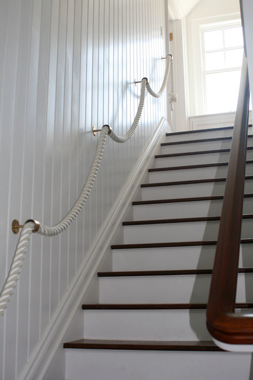 coastal style staircase rope handrail