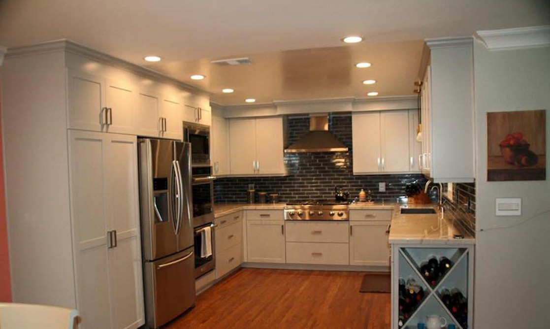Transitional White Kitchen with Blue Subway Tiles