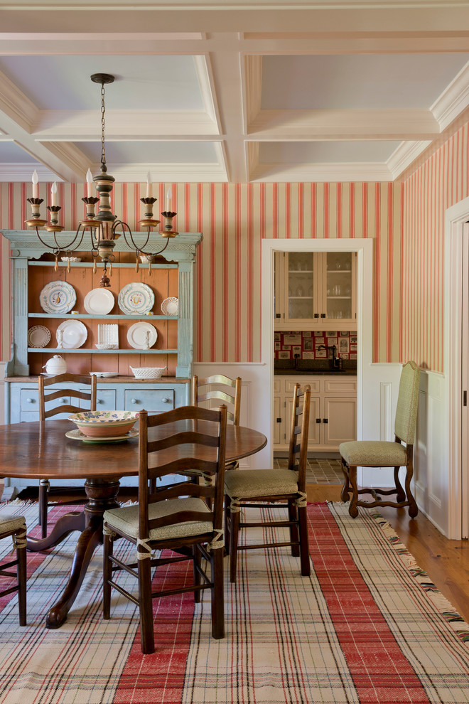 Design ideas for a traditional separate dining room in New York with medium hardwood floors.