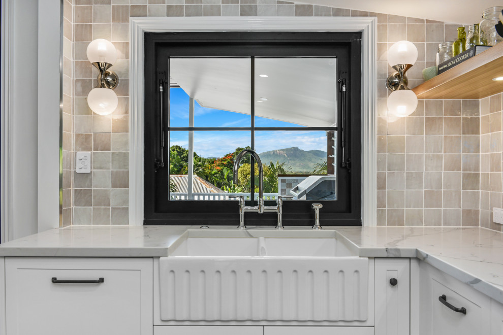 Photo of a transitional laundry room in Townsville.