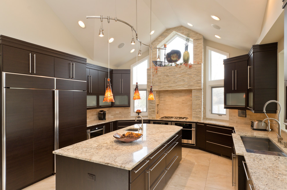 Design ideas for a contemporary u-shaped eat-in kitchen in Chicago with a double-bowl sink, shaker cabinets, dark wood cabinets, granite benchtops, beige splashback, stone tile splashback, panelled appliances and beige benchtop.