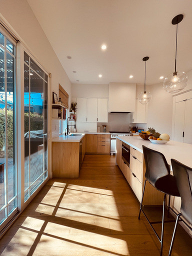 White Oak Flooring & Cabinets, Island, Countertops, Windows & Lighting