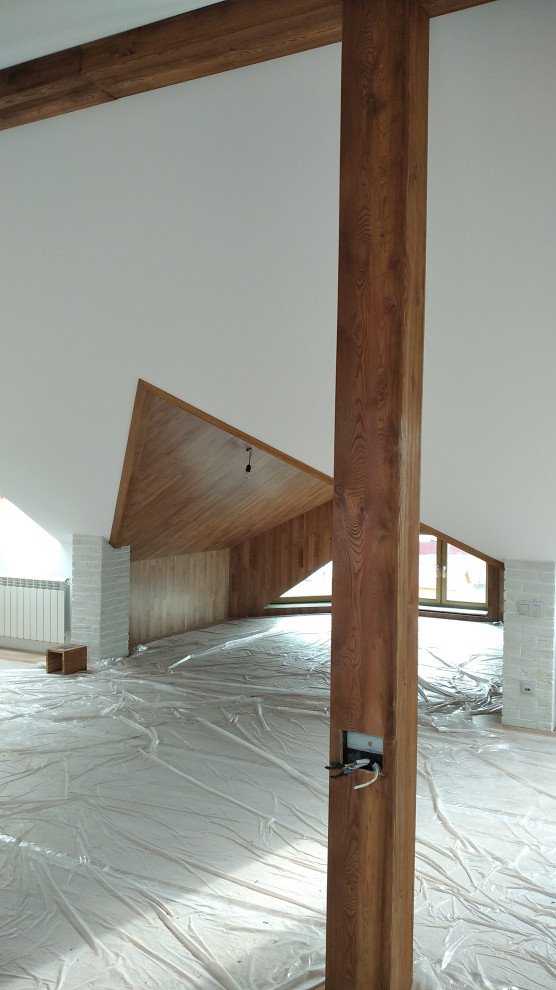 Отделка мансарды деревом