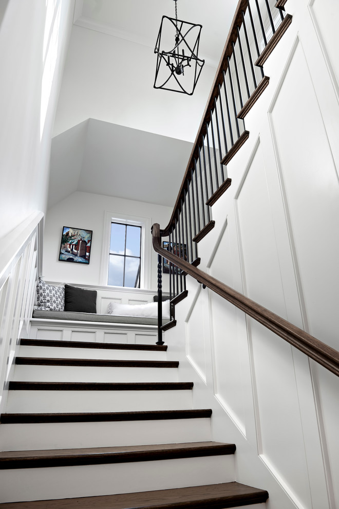 Design ideas for a mid-sized transitional wood staircase in Nashville with wood risers.