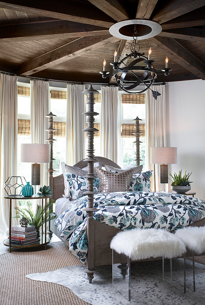 Example of a transitional bedroom design in Austin
