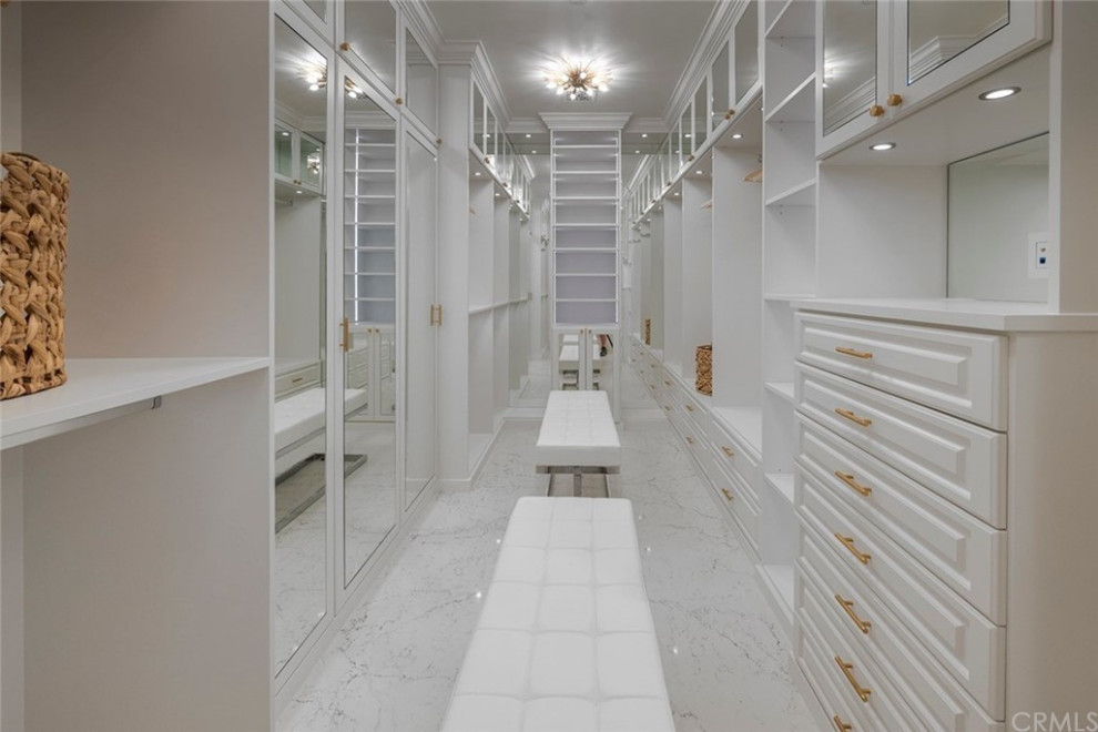 This is an example of a contemporary storage and wardrobe in Orange County.