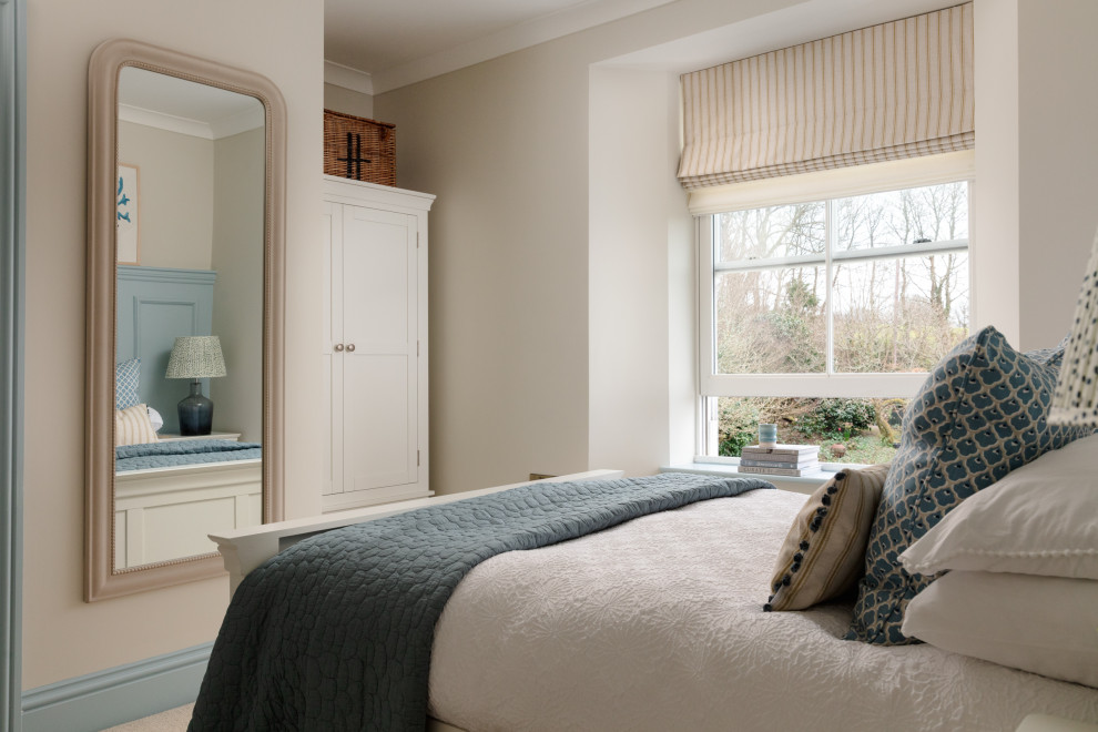 Design ideas for a medium sized nautical guest bedroom in Cornwall with white walls, carpet, no fireplace, beige floors, panelled walls and a feature wall.
