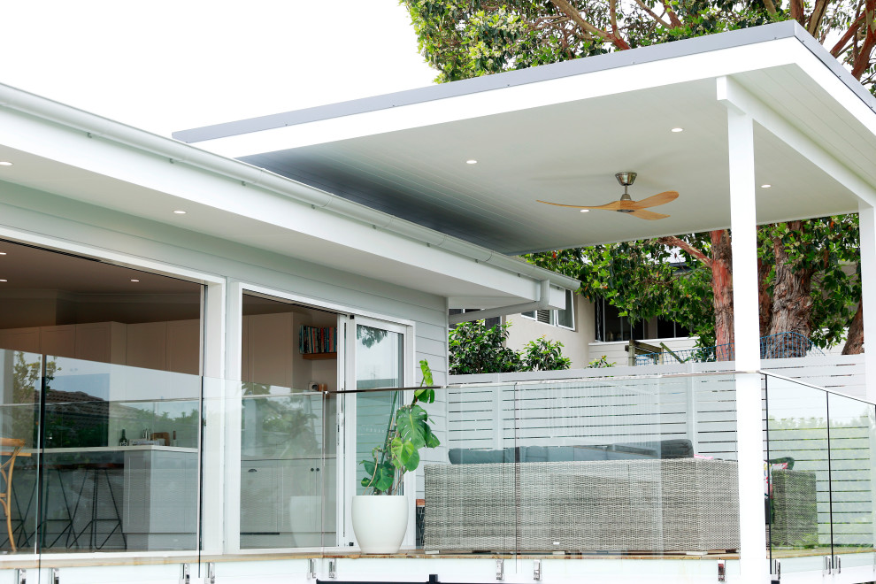 Design ideas for a beach style deck in Sydney.