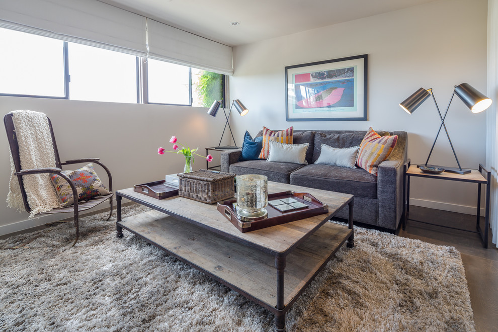 Inspiration for a contemporary enclosed family room remodel in Los Angeles with white walls