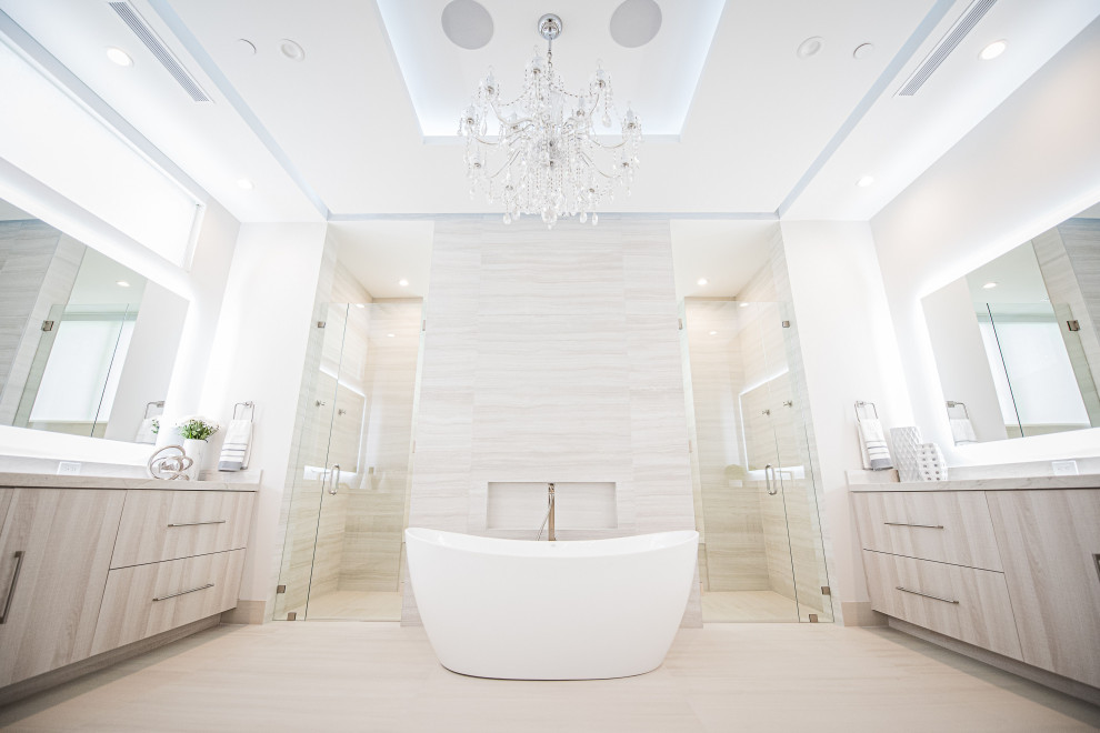 Example of a huge minimalist master white tile and porcelain tile porcelain tile, beige floor, double-sink and tray ceiling bathroom design in Miami with flat-panel cabinets, beige cabinets, a bidet, white walls, an undermount sink, quartzite countertops, a hinged shower door, beige countertops and a built-in vanity