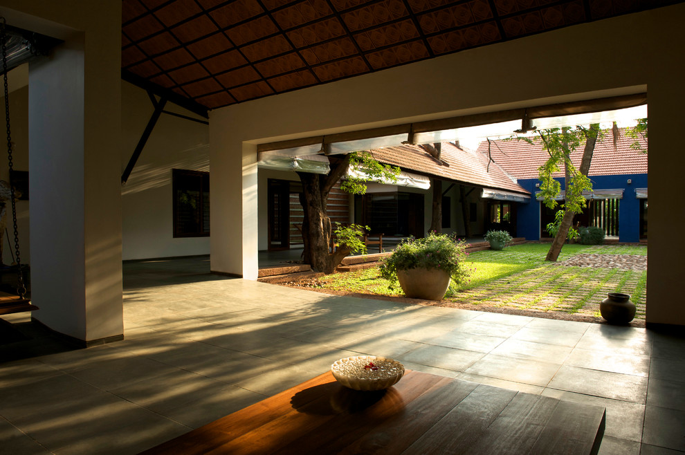 This is an example of a tropical home design in Bengaluru.
