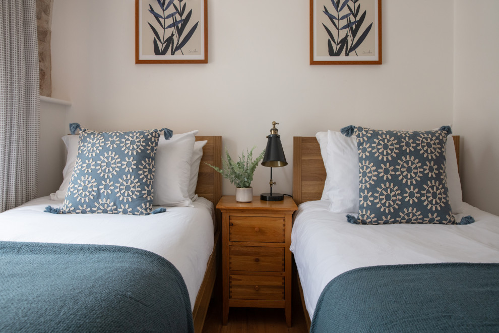 This is an example of a world-inspired guest bedroom in Cornwall.