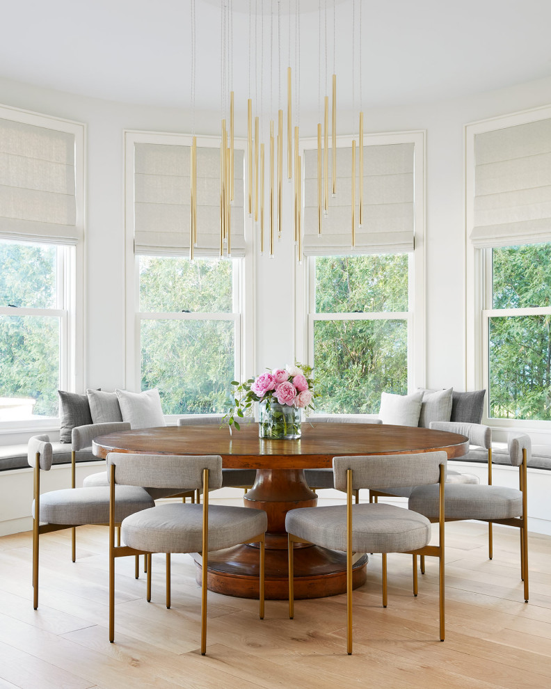 Lakehouse Lux - Inspiration for a small coastal light wood floor breakfast nook remodel in Chicago with white walls and no fireplace