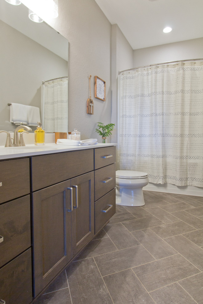 Bathroom - transitional vinyl floor, gray floor and single-sink bathroom idea in Other with recessed-panel cabinets, medium tone wood cabinets, an undermount sink, quartz countertops, white countertops and a built-in vanity