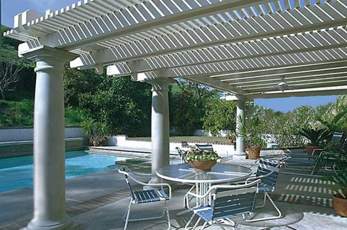 Photo of a mid-sized traditional backyard patio in San Diego with a pergola.