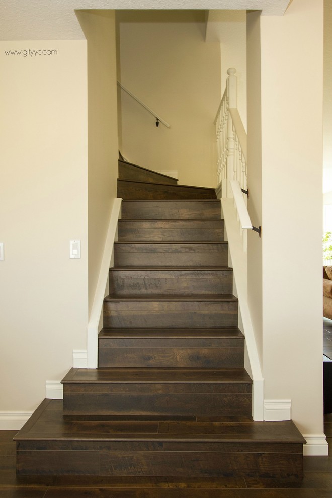 Staircase - mid-sized rustic l-shaped wood railing staircase idea in Calgary