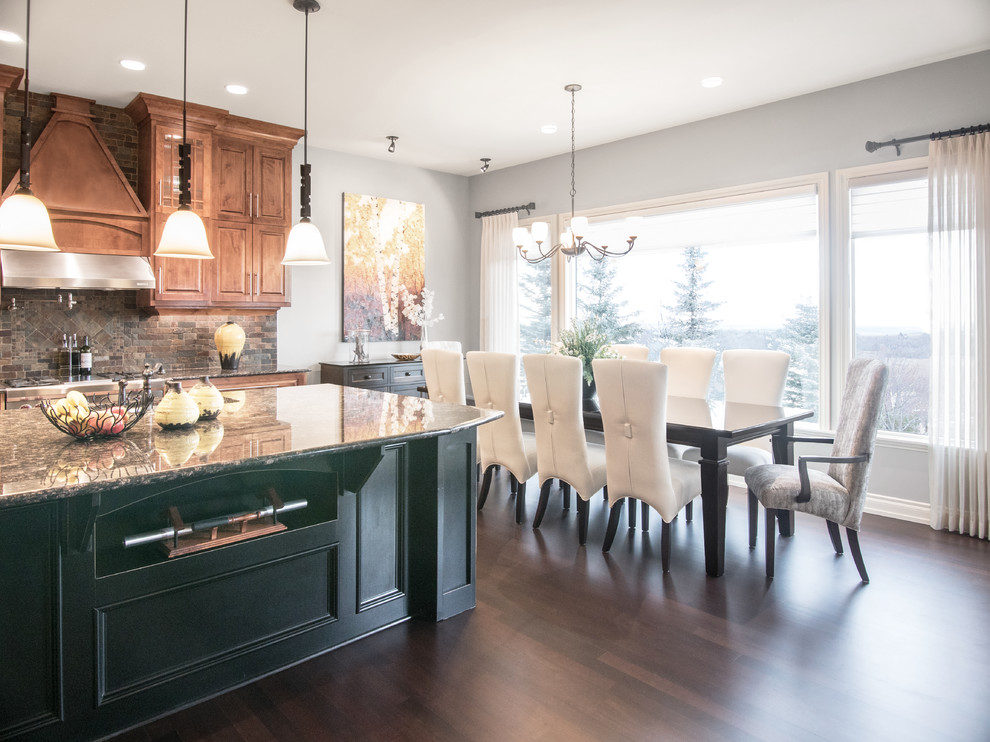Inspiration for a transitional dining room in Calgary with dark hardwood floors.