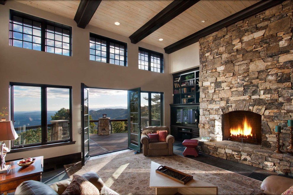 Inspiration for an expansive transitional formal open concept living room in Other with beige walls, slate floors, a standard fireplace, a stone fireplace surround and a built-in media wall.