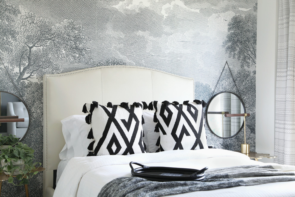 Inspiration for a transitional bedroom in Austin with grey walls.
