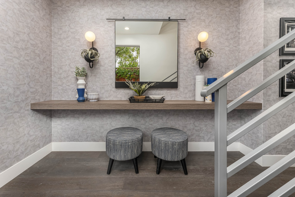 Photo of a small contemporary foyer in Los Angeles with grey walls.