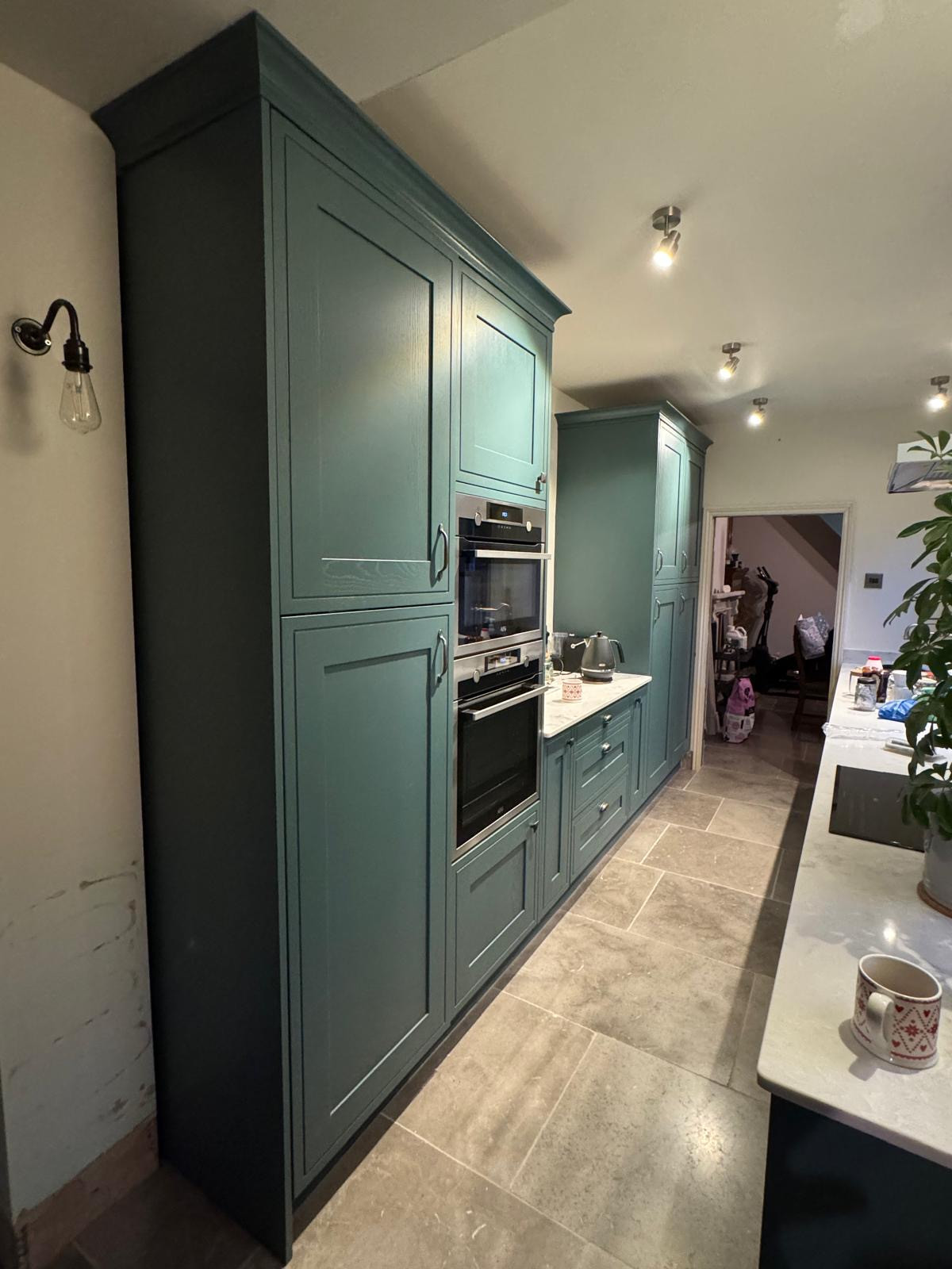 A Dark Coloured Gally Kitchen