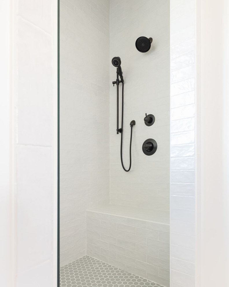 Transitional bathroom photo in Atlanta with a hinged shower door