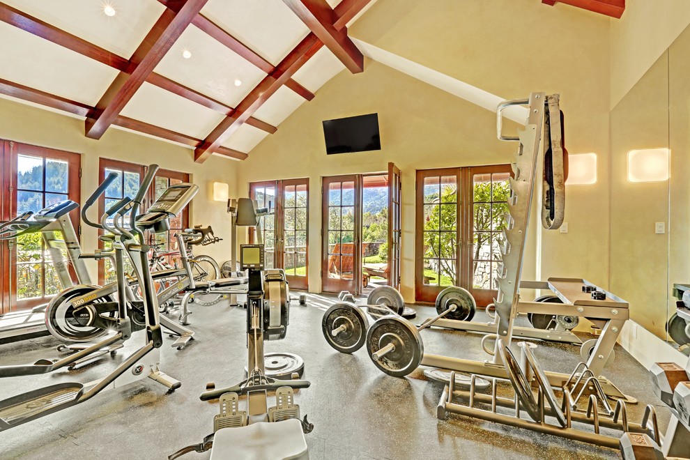 Design ideas for an expansive traditional home weight room in San Francisco with green walls.