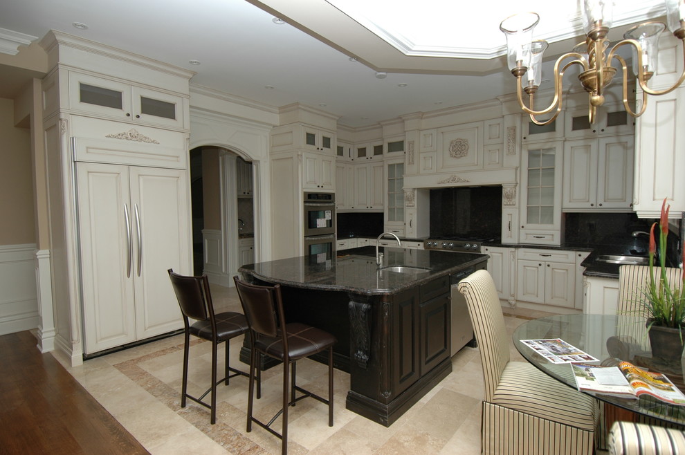 Example of a transitional kitchen design in Toronto