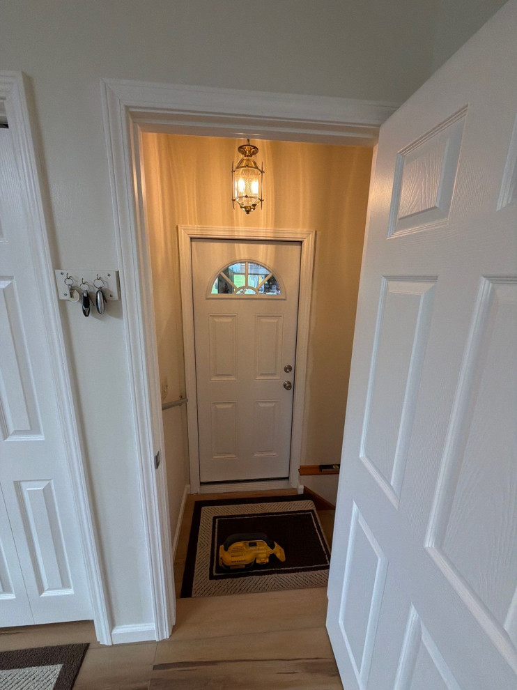 New doors entering remodeled laundry room