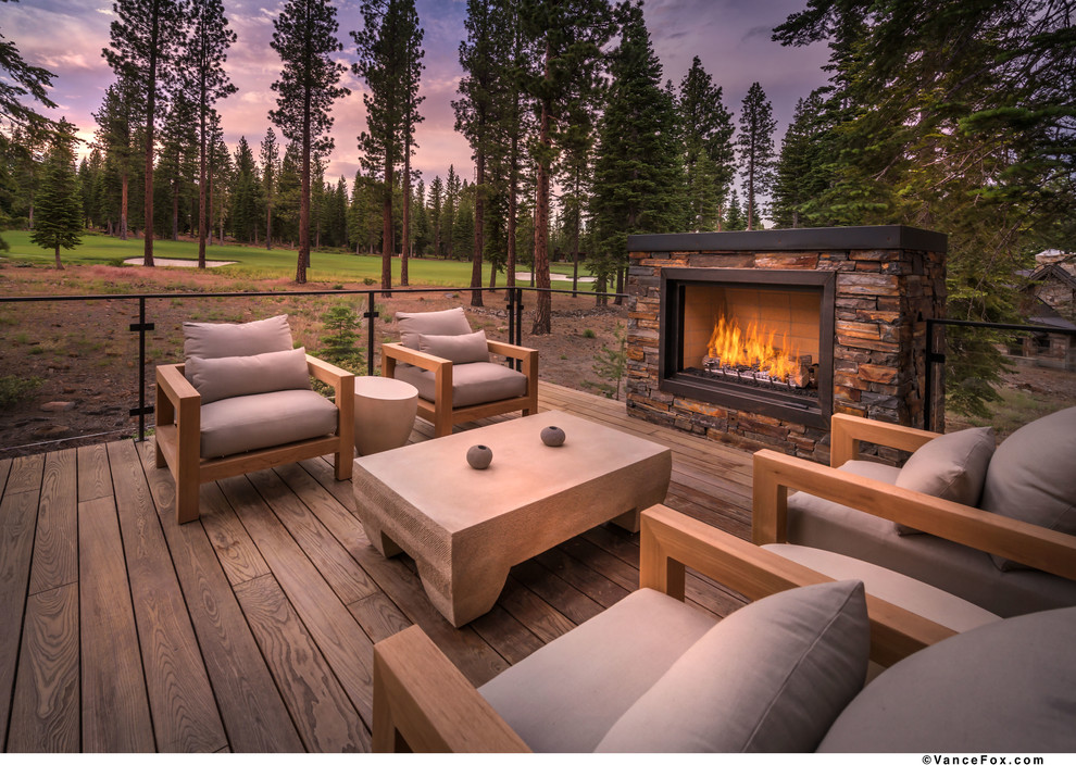 Design ideas for a contemporary backyard verandah in Sacramento with a fire feature and decking.