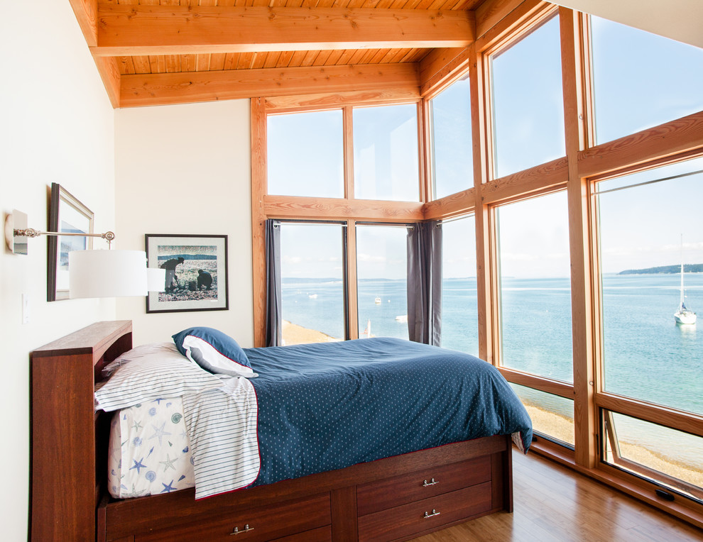 This is an example of a beach style bedroom in Seattle.