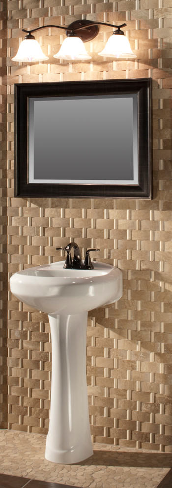 Transitional bathroom in Atlanta with a pedestal sink, beige tile, stone tile, beige walls and travertine floors.