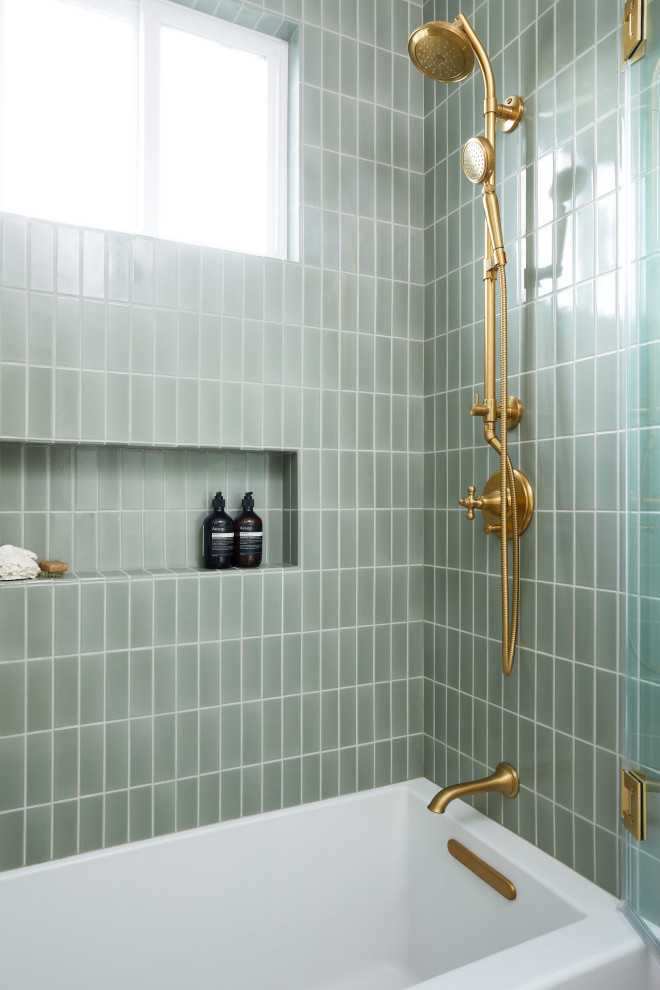 Inspiration for a small traditional bathroom in San Francisco with white cabinets, an alcove tub, a shower/bathtub combo, a one-piece toilet, green tile, ceramic tile, white walls, ceramic floors, a pedestal sink, orange floor, a hinged shower door, a niche, a single vanity and a freestanding vanity.
