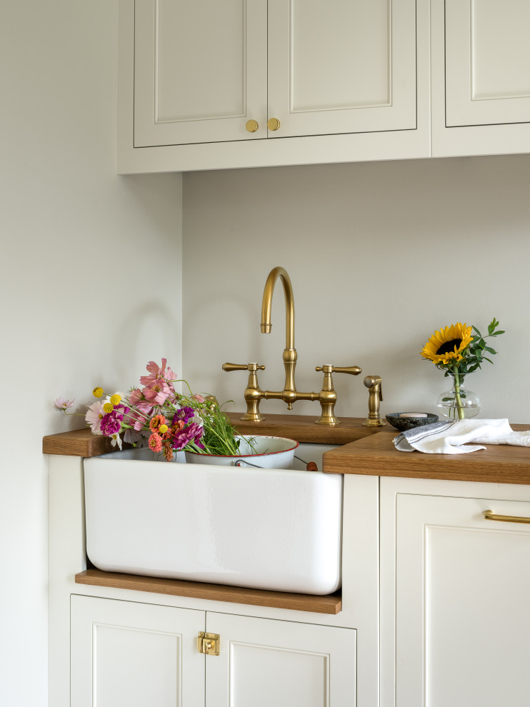 Inspiration for a transitional laundry room remodel in Burlington