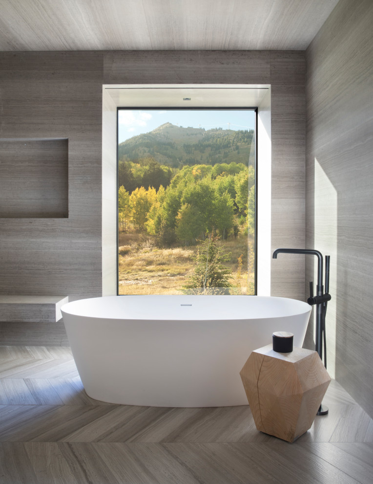 Inspiration for an expansive country master bathroom in Other with flat-panel cabinets, medium wood cabinets, a freestanding tub, multi-coloured tile, wood-look tile, grey walls, wood-look tile, a drop-in sink, concrete benchtops, beige floor, grey benchtops, a shower seat, a double vanity, a floating vanity and wood.