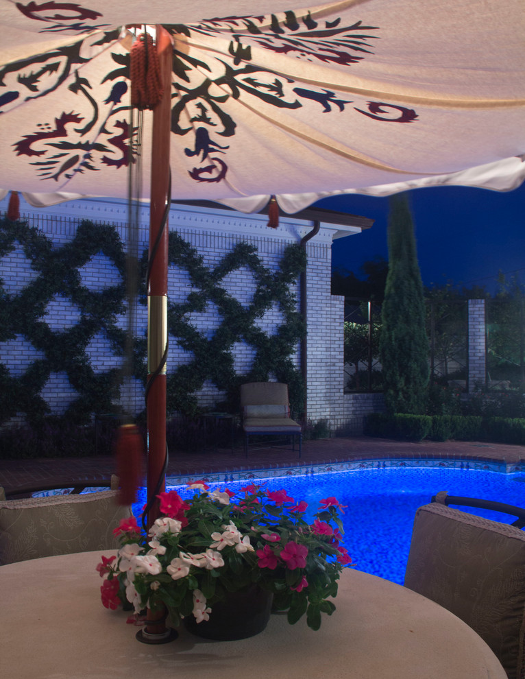 Transitional pool photo in Austin