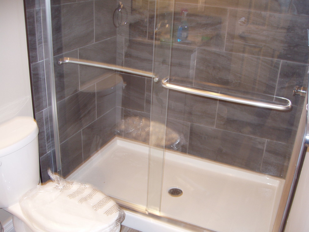 Transitional bathroom photo in Calgary