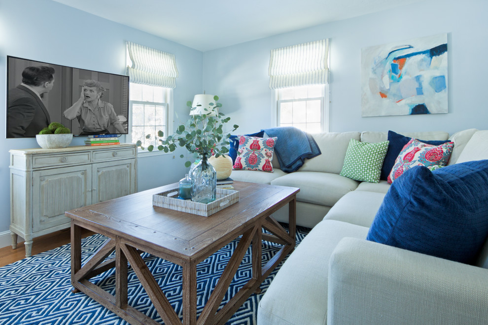 Photo of a transitional family room in Boston.
