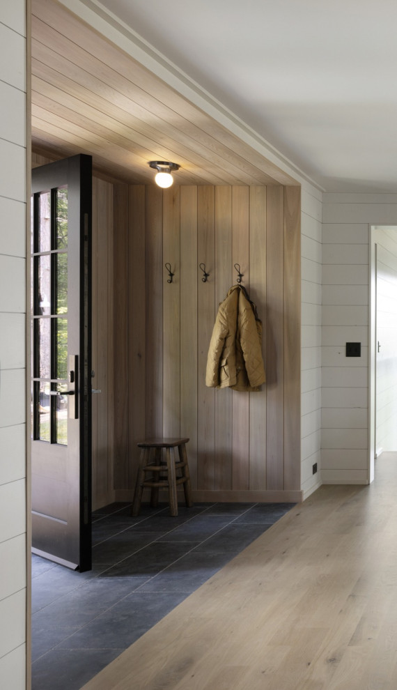 Inspiration for a rustic entryway remodel in Minneapolis