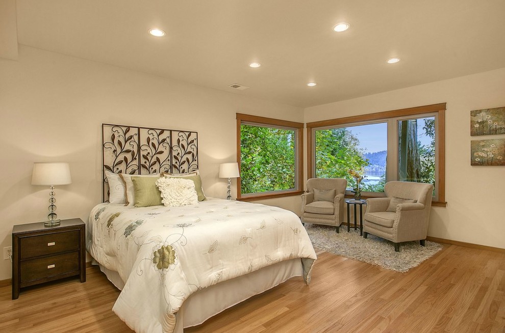 Example of a transitional bedroom design in Seattle
