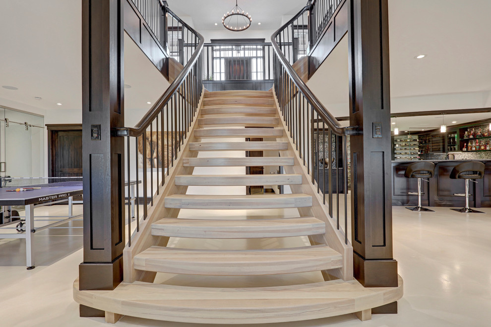 Large transitional wooden floating open staircase photo in Calgary