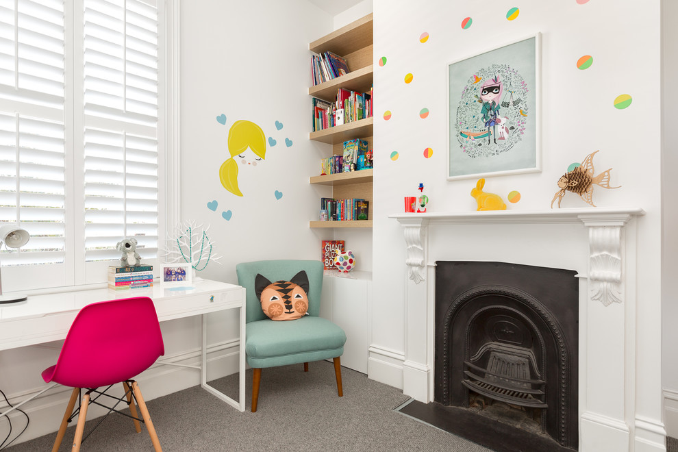 Contemporary kids' study room in Melbourne with white walls, carpet and grey floor for girls.