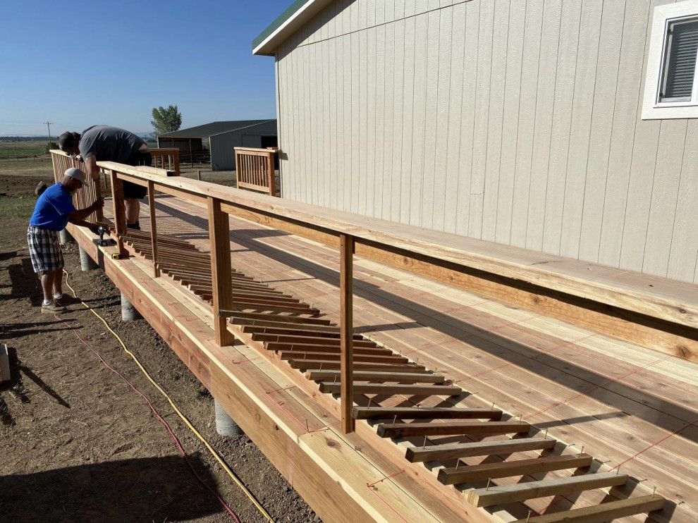 Example of a mountain style home design design in Albuquerque