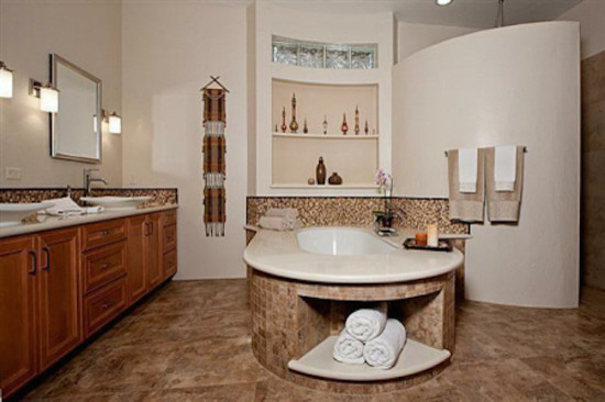 Inspiration for a transitional brown tile bathroom remodel in Phoenix with a vessel sink, raised-panel cabinets, medium tone wood cabinets and white walls